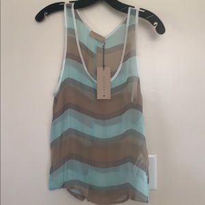 Adorable striped sheer sleeveless blouse. Medium